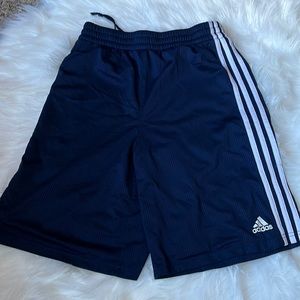 One pair of adidas mesh shorts for kids. Size 18-20